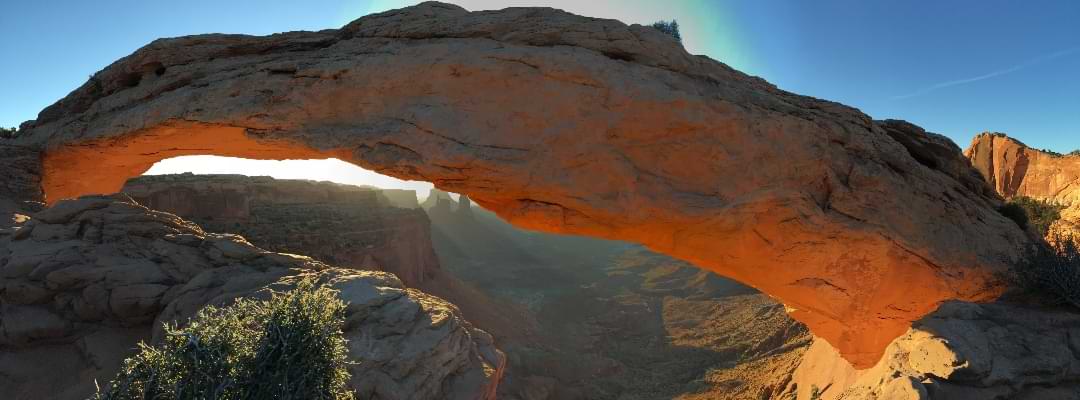 Sunrise at Mesa Arch framing the canyons of Canyonlands National Park
