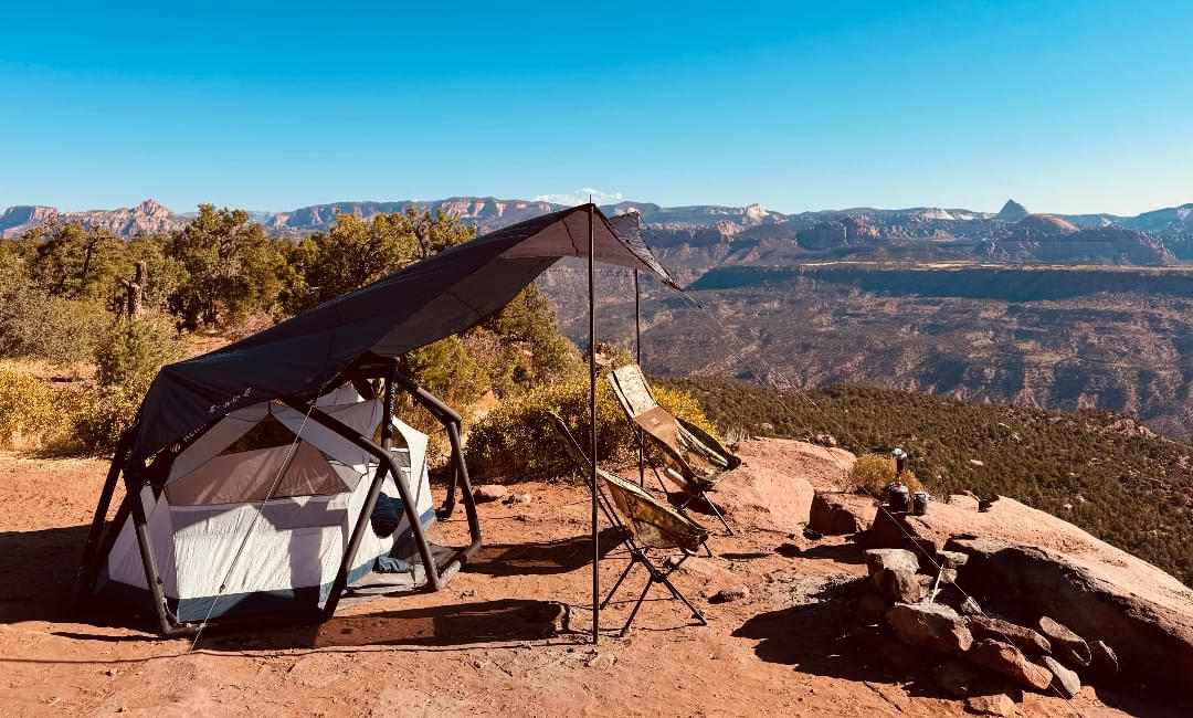Morning light over remote canyon campsite