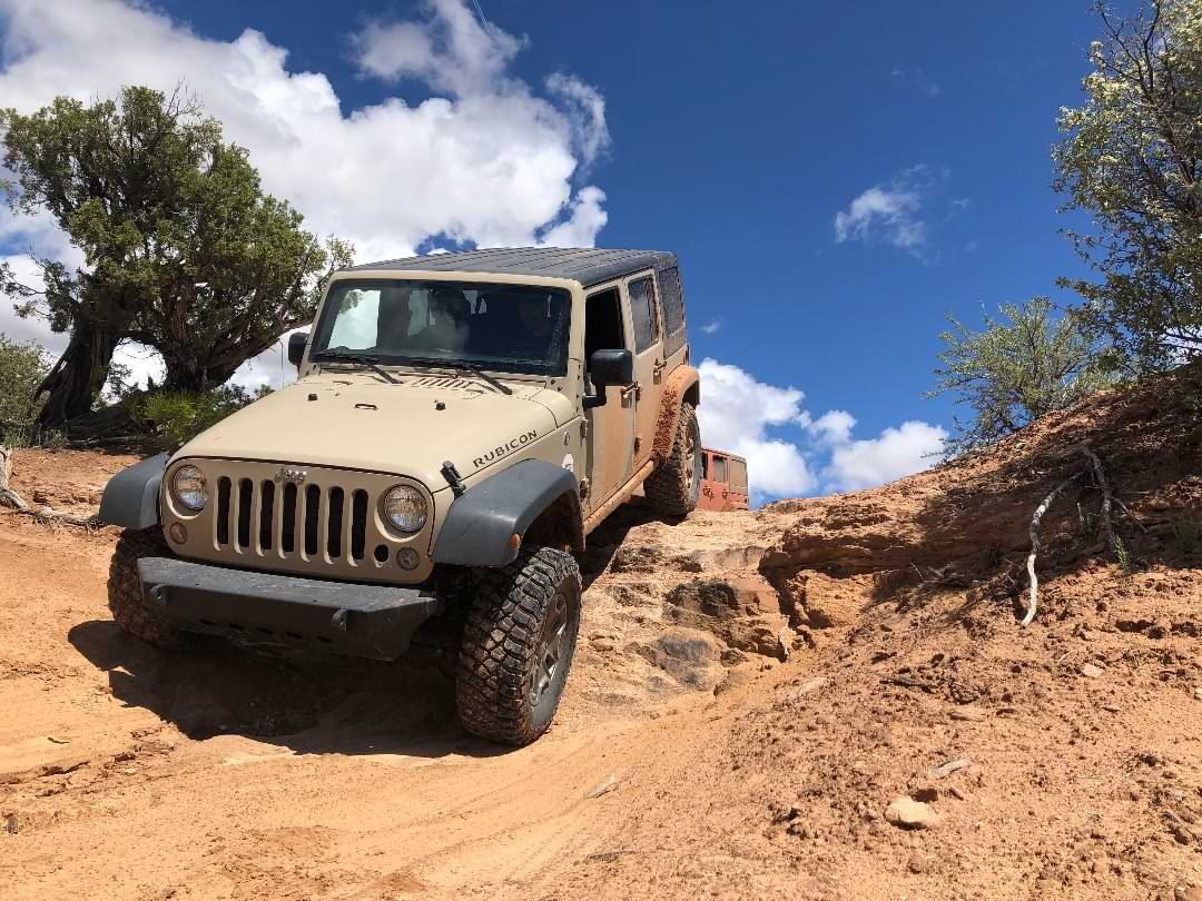 Rubicon Jeep climbing Utah slickrock obstacle