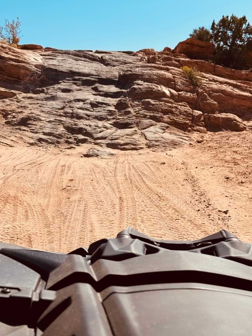 RZR view climbing Moab slickrock wall