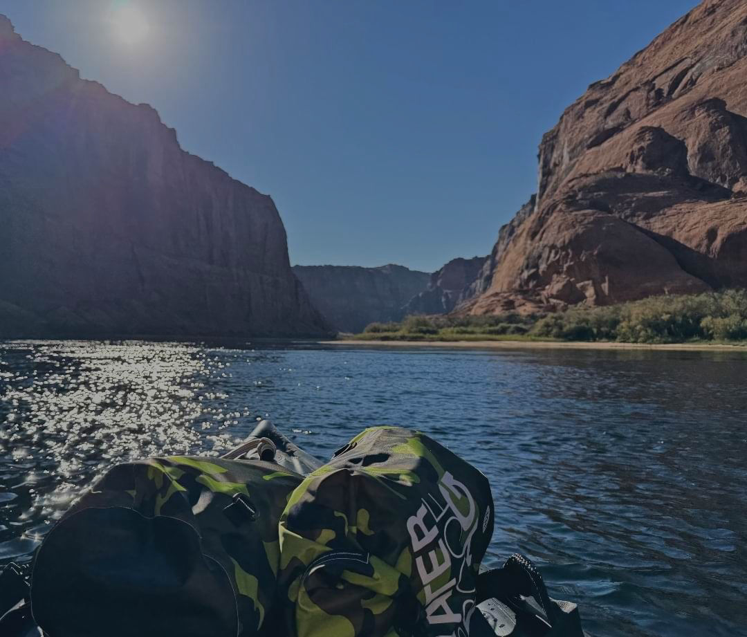 Scenic boat tour through calm waters and dramatic canyon cliffs in the Southwest